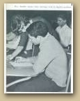 Mrs. Stauffer Assists A student with an algebra problem
Alexander Ramsey High School Yearbook 1965
 » Click to zoom ->